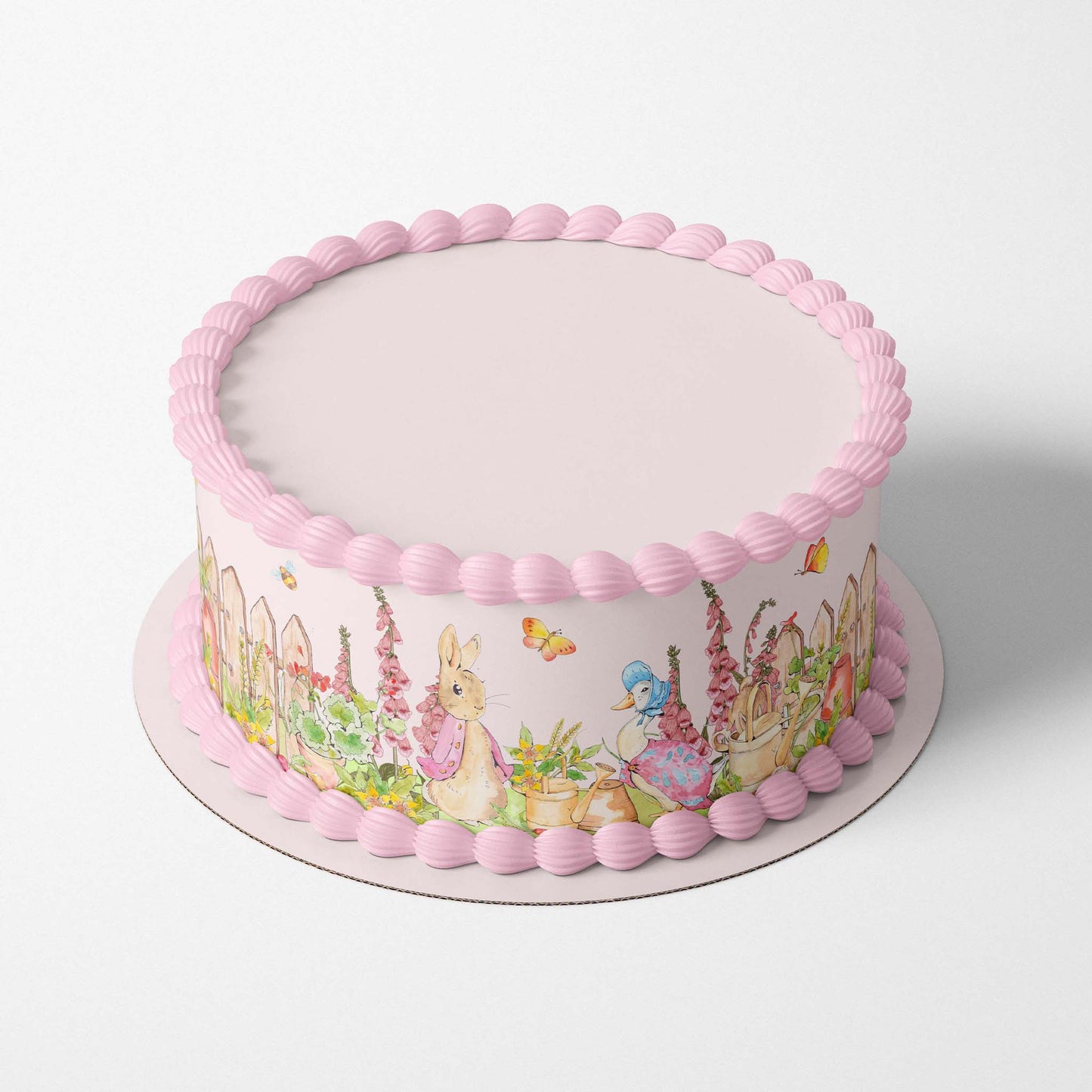 Add these adorable Beatrix Potter-inspired edible icing cake wrap featuring Peter Rabbit and Jemima Puddle-duck characters in the summer garden on cakes or any sweet treats. These sweet icing sheets are perfect for a baby shower, or Beatrix Potter themed birthday party.
